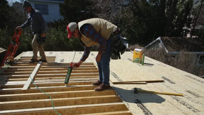 Structural steel and strong connections help a raised floor resist high winds and water.